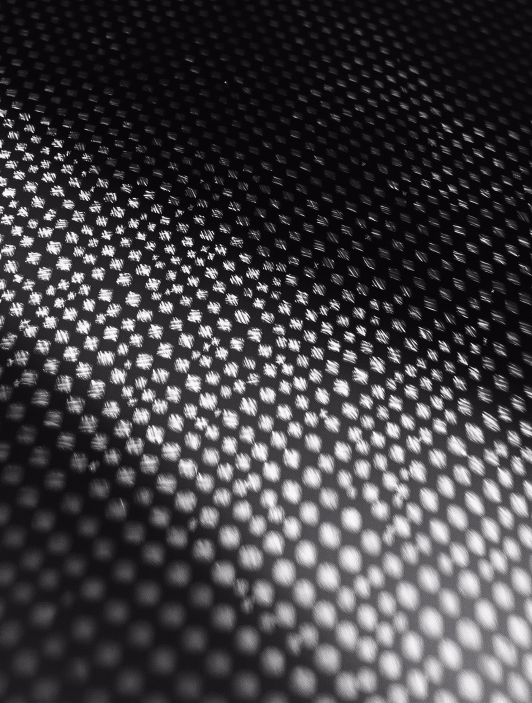 Carbon fibre weave in macro detail.