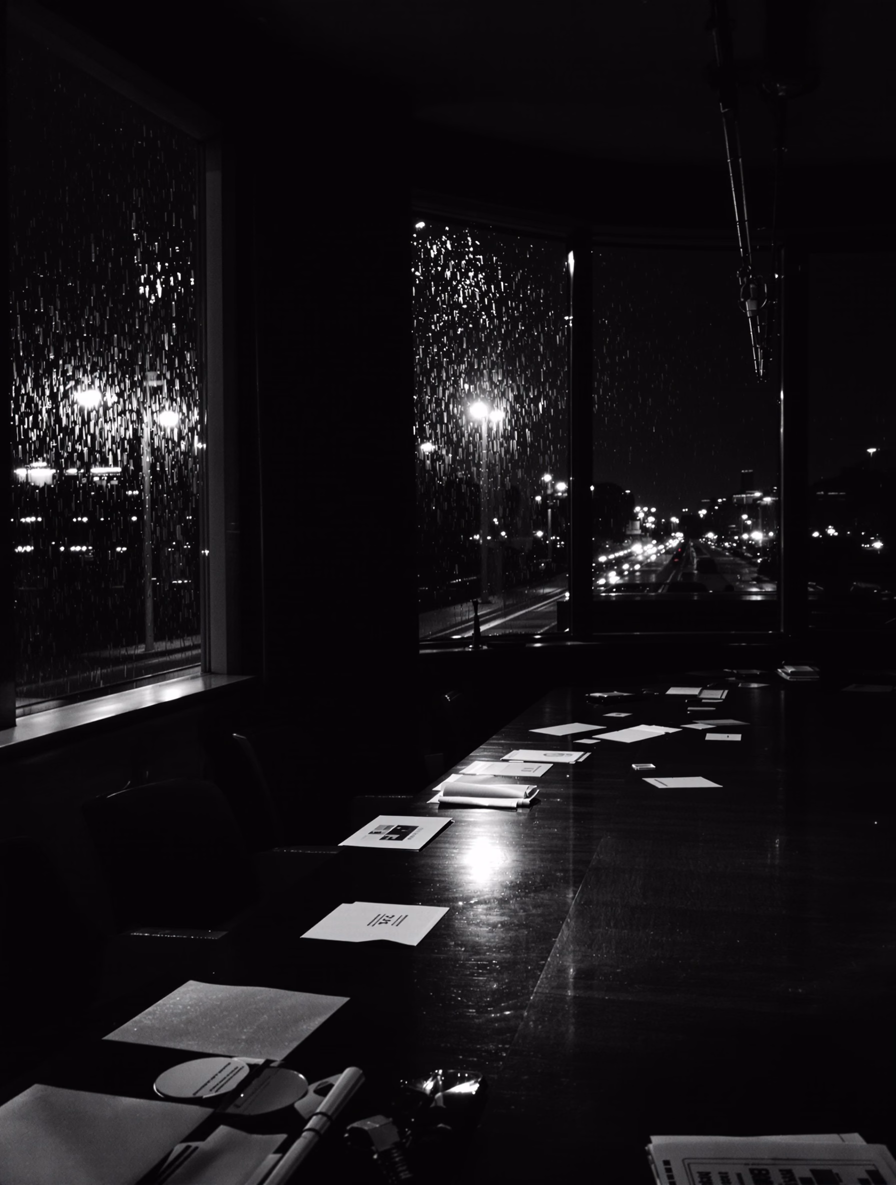 A London boardroom at night, rain-streaked windows, papers on a long table, city lights beyond.
